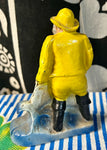 VINTAGE POT METAL FISHERMAN WITH NET BOTTLE OPENER