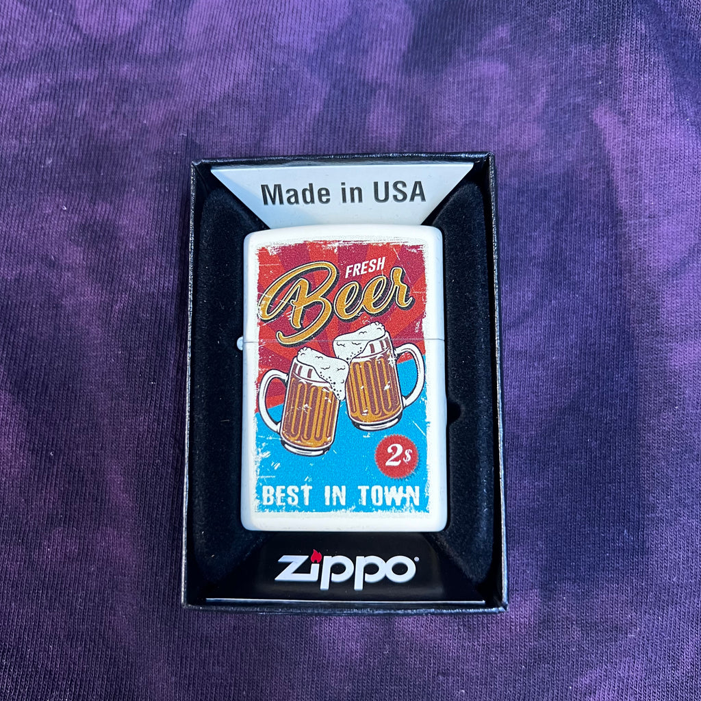 Cream colored zippo lighter w/Fresh Beer Best in Town 2 cent